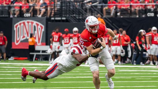 UNLV quarterback Matthew Sluka (3) strides for a first down while dodging tackles during college football game against Utah Tech on Saturday Sept. 7, 2024 in Las Vegas. (Kalin Sipes - The Sporting Tribune) UNLV quarterback Matthew Sluka (3) strides for a first down while dodging tackles during college football game against Utah Tech on Saturday Sept. 7, 2024 in Las Vegas. (Kalin Sipes - The Sporting Tribune)