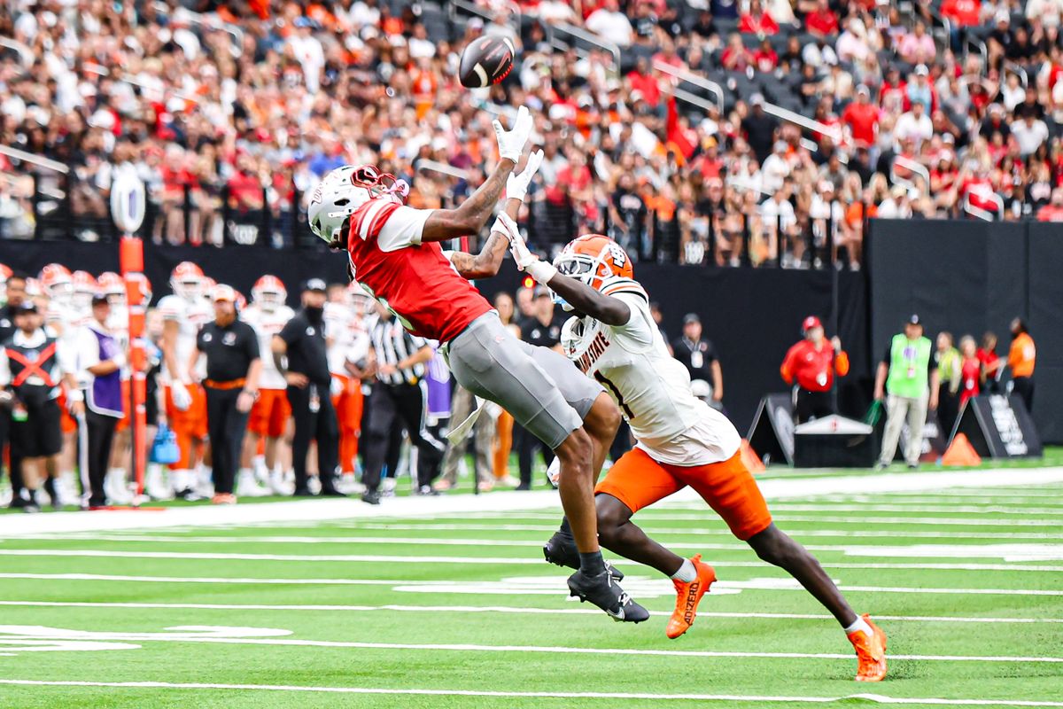 UNLV Rebels WR Jaden Bradley (6) makes a jumping catch over an Idaho State Bengals defender during the third quarter of a college football game on Saturday August 23, 2025, in Las Vegas, Nevada. 