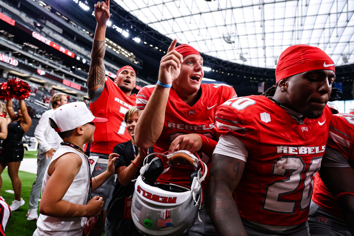 UNLV Rebels QB Anthony Colandrea (10) celebrates with his teammates after defeating the Idaho State Bengals on Saturday August 23, 2025, in Las Vegas, Nevada. 