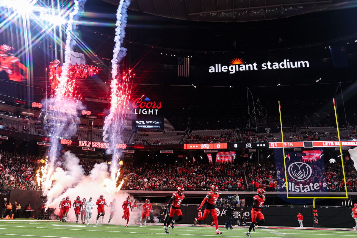 UNLV Rebels players run out for their game against the Hawai'i Rainbow Warriors on Friday November 21, 2025, in Las Vegas, Nevada. 