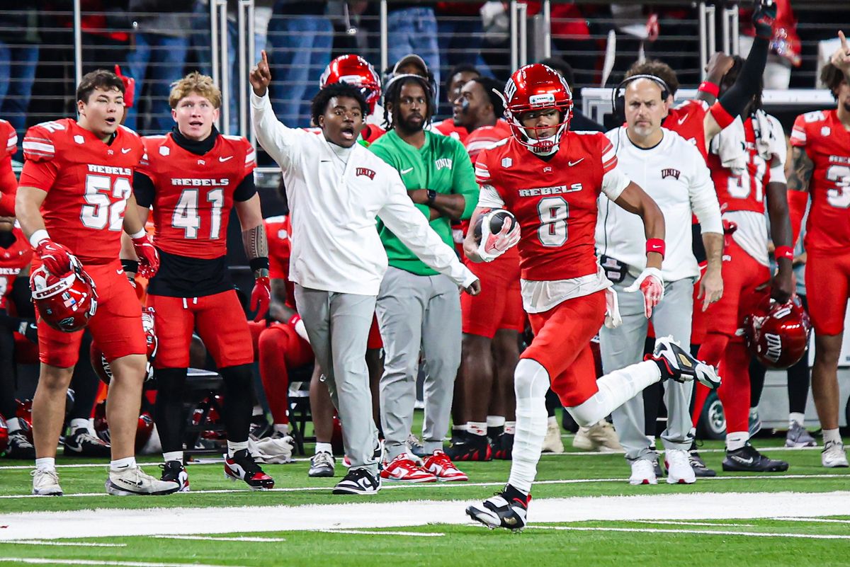 UNLV Rebels WR Taeshaun Lyons (8) runs past his sideline prior to scoring against the Hawai'i Rainbow Warriors on Friday November 21, 2025, in Las Vegas, Nevada. 