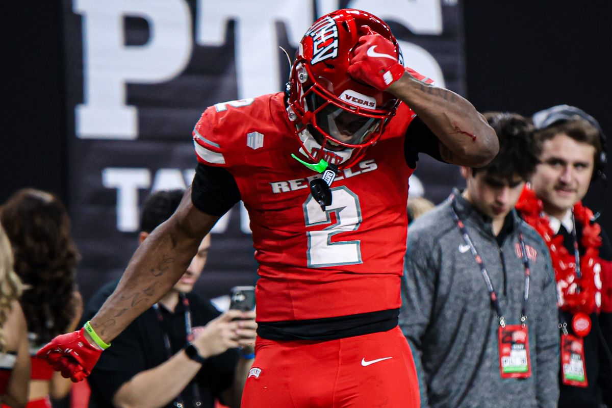 UNLV Rebels RB Denver Harris (2) celebrates after scoring a touchdown against the Hawai'i Rainbow Warriors on Friday November 21, 2025, in Las Vegas, Nevada. 