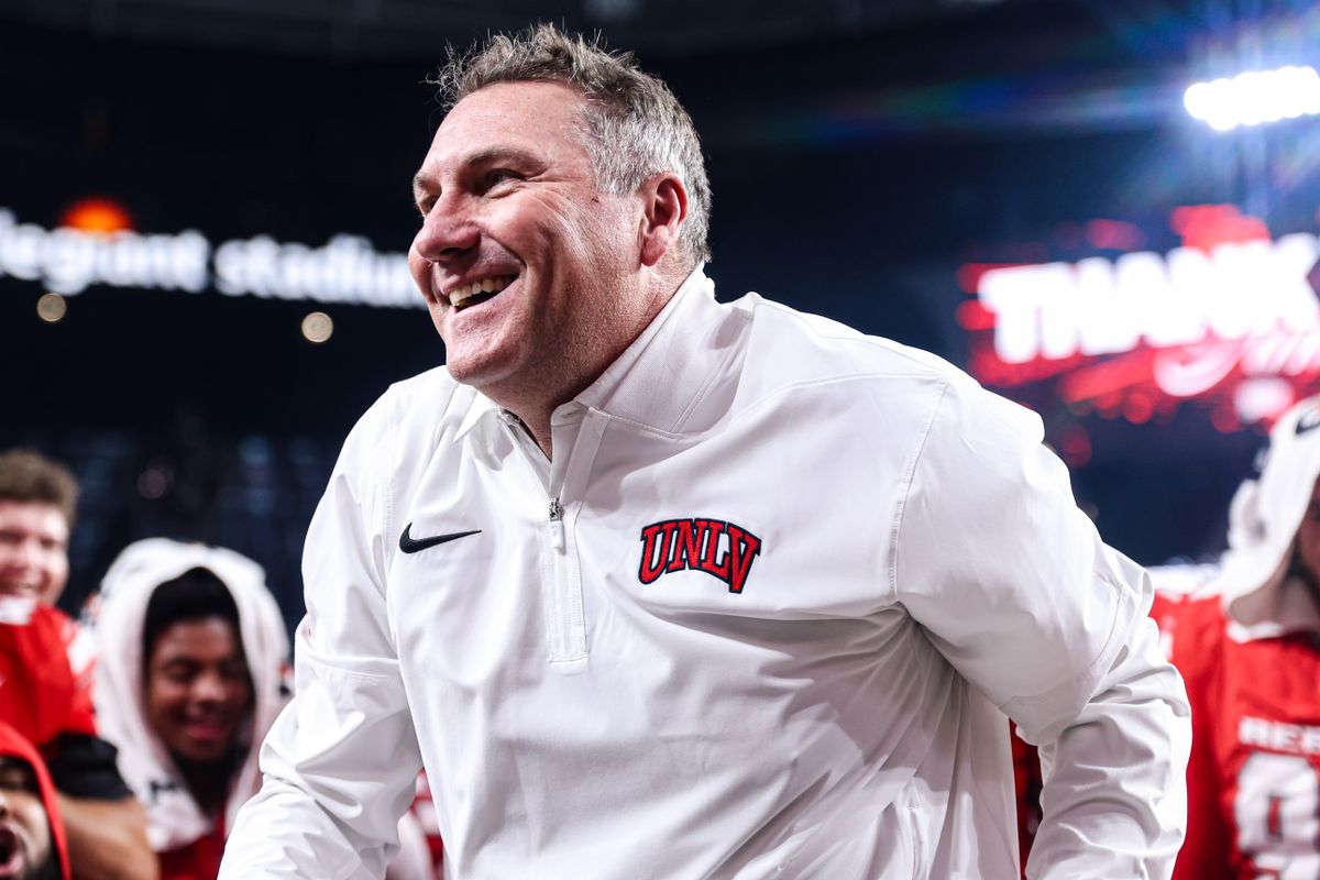 UNLV Rebels HC Dan Mullen smiles after defeating the Hawai'i Rainbow Warriors in the 9th Island Showdown on Friday November 21, 2025, in Las Vegas, Nevada. 