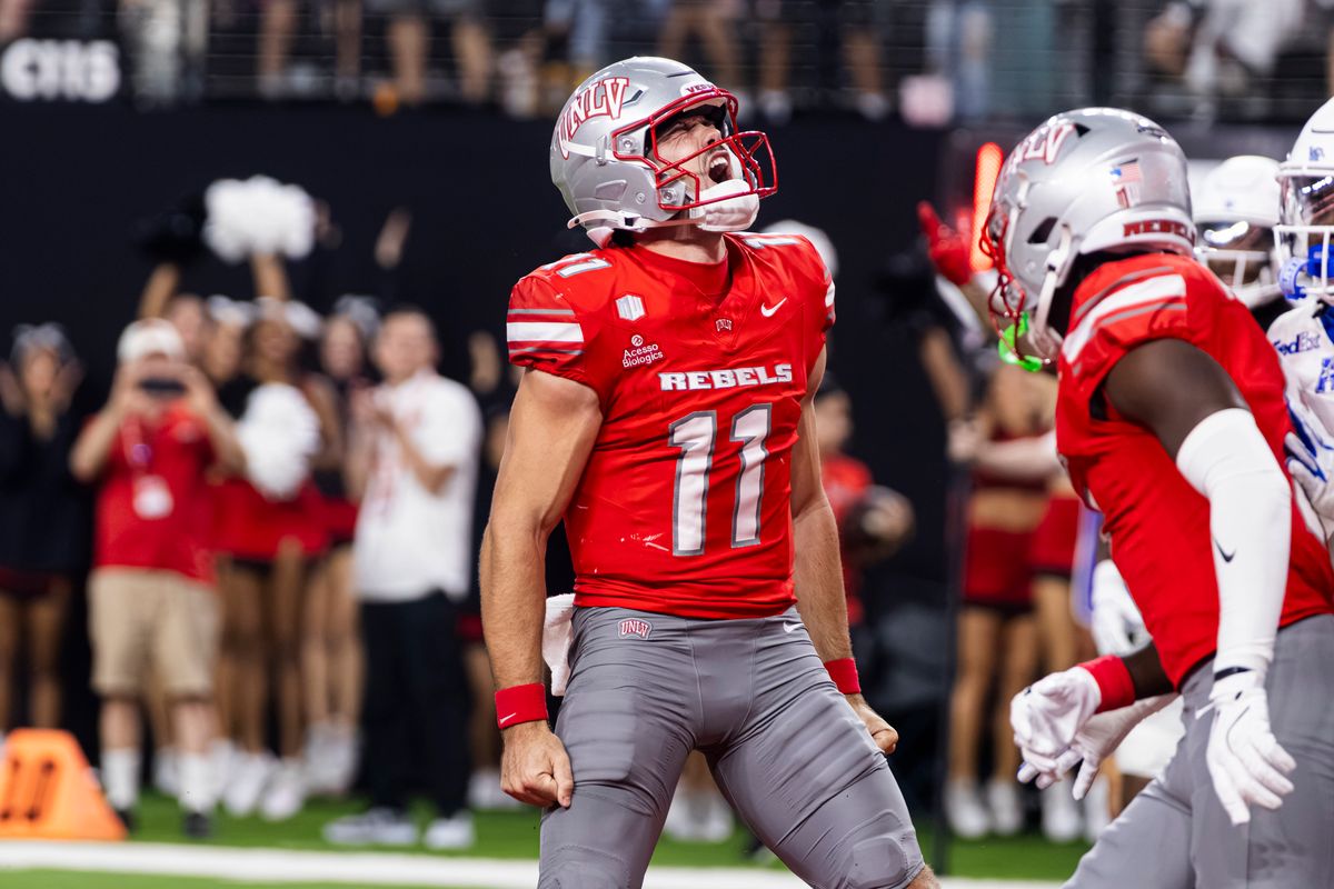 UNLV Rebels QB Jackson Arnold (11) celebrates after he scored a rushing touchdown against the Memphis Tigers on Friday, August 29, 2026, at Allegiant Stadium in Las Vegas, Nevada. UNLV Rebels QB Jackson Arnold (11) celebrates after he scored a rushing touchdown against the Memphis Tigers on Friday, August 29, 2026, at Allegiant Stadium in Las Vegas, Nevada.