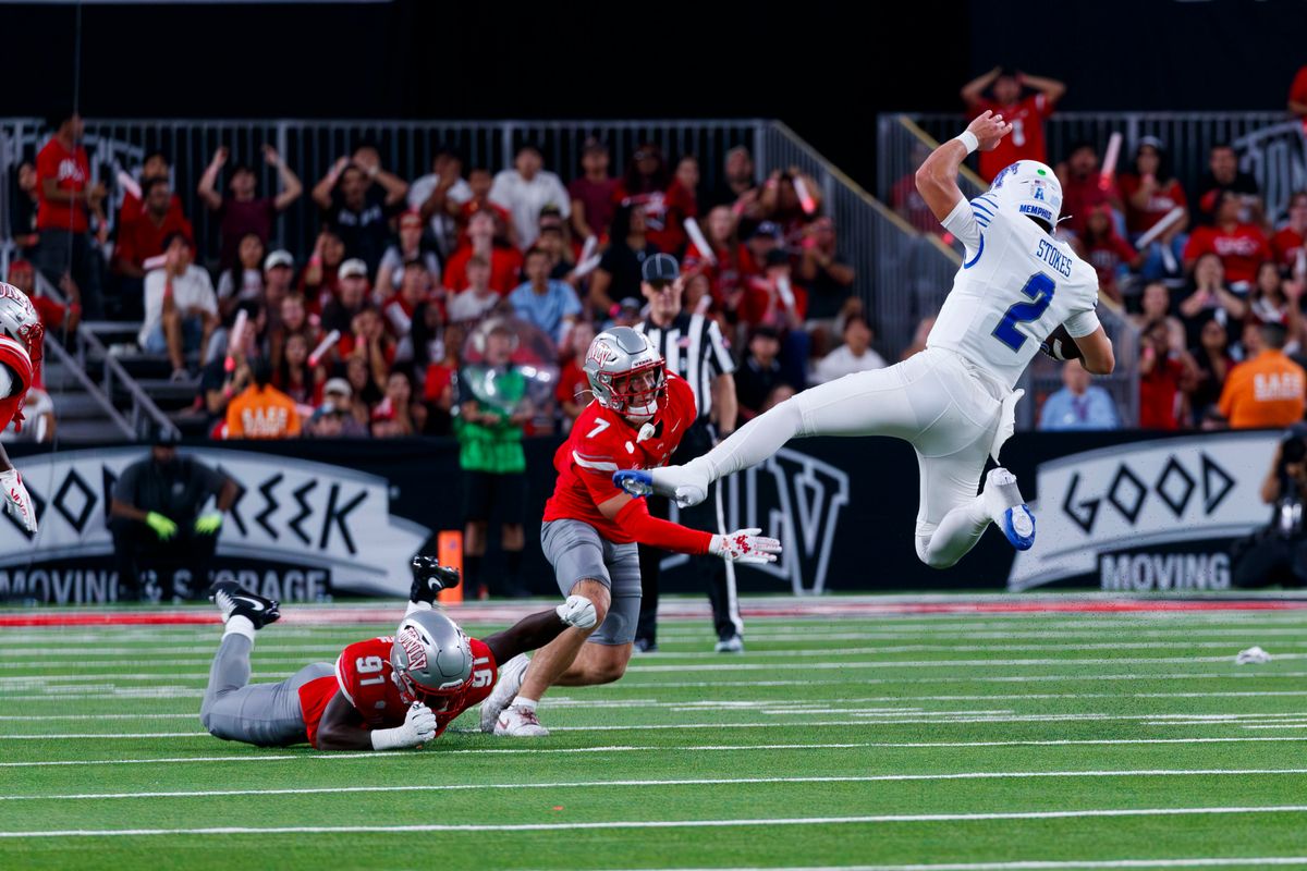 UNLV Football outside linebacker Elias Rudolph and UNLV Football safety Jake Pope take down Memphis quarterback Marcus Stokes during a non-conference college football game against the Memphis Tigers on Saturday, August 29, 2026, at Allegiant Stadium in Las Vegas, NV. UNLV Football outside linebacker Elias Rudolph and UNLV Football safety Jake Pope take down Memphis quarterback Marcus Stokes during a non-conference college football game against the Memphis Tigers on Saturday, August 29, 2026, at Allegiant Stadium in Las Vegas, NV.
