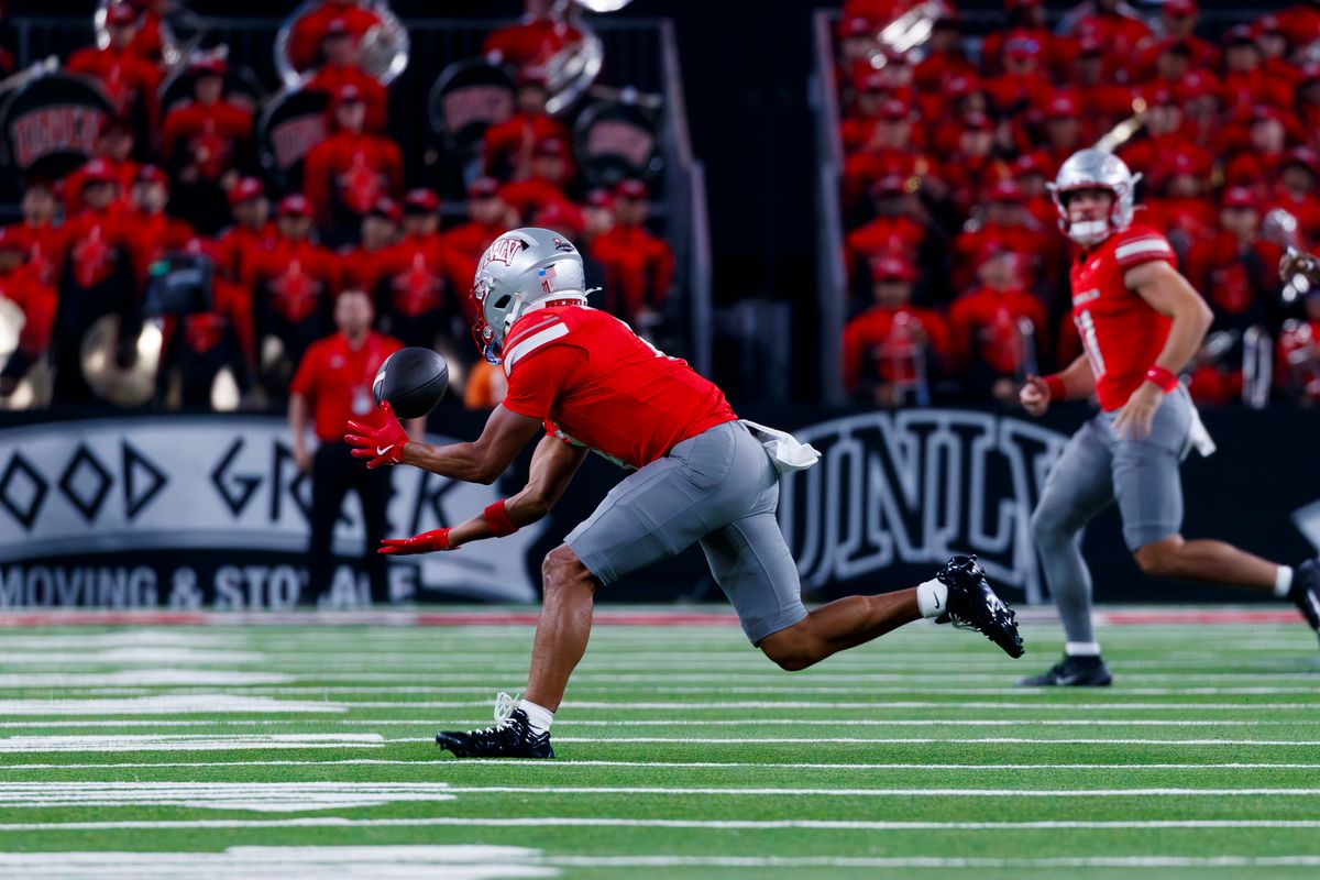 UNLV Football wide reciever DeAngelo Irvin Jr. catches a pass from UNLV Football quarterback Jackson Arnold during a non-conference college football game against the Memphis Tigers on Saturday, August 29, 2026, at Allegiant Stadium in Las Vegas, NV. UNLV Football wide reciever DeAngelo Irvin Jr. catches a pass from UNLV Football quarterback Jackson Arnold during a non-conference college football game against the Memphis Tigers on Saturday, August 29, 2026, at Allegiant Stadium in Las Vegas, NV.