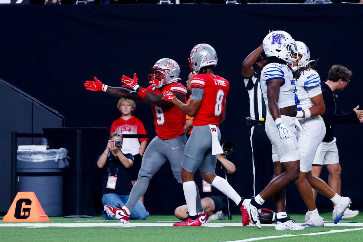 UNLV Football running back Jai’Den Thomas and UNLV Football wide receiver Taeshaun Lyons celebrate a first down during a non-conference college football game against the Memphis Tigers on Saturday, August 29, 2026, at Allegiant Stadium in Las Vegas, NV. UNLV Football running back Jai’Den Thomas and UNLV Football wide receiver Taeshaun Lyons celebrate a first down during a non-conference college football game against the Memphis Tigers on Saturday, August 29, 2026, at Allegiant Stadium in Las Vegas, NV.