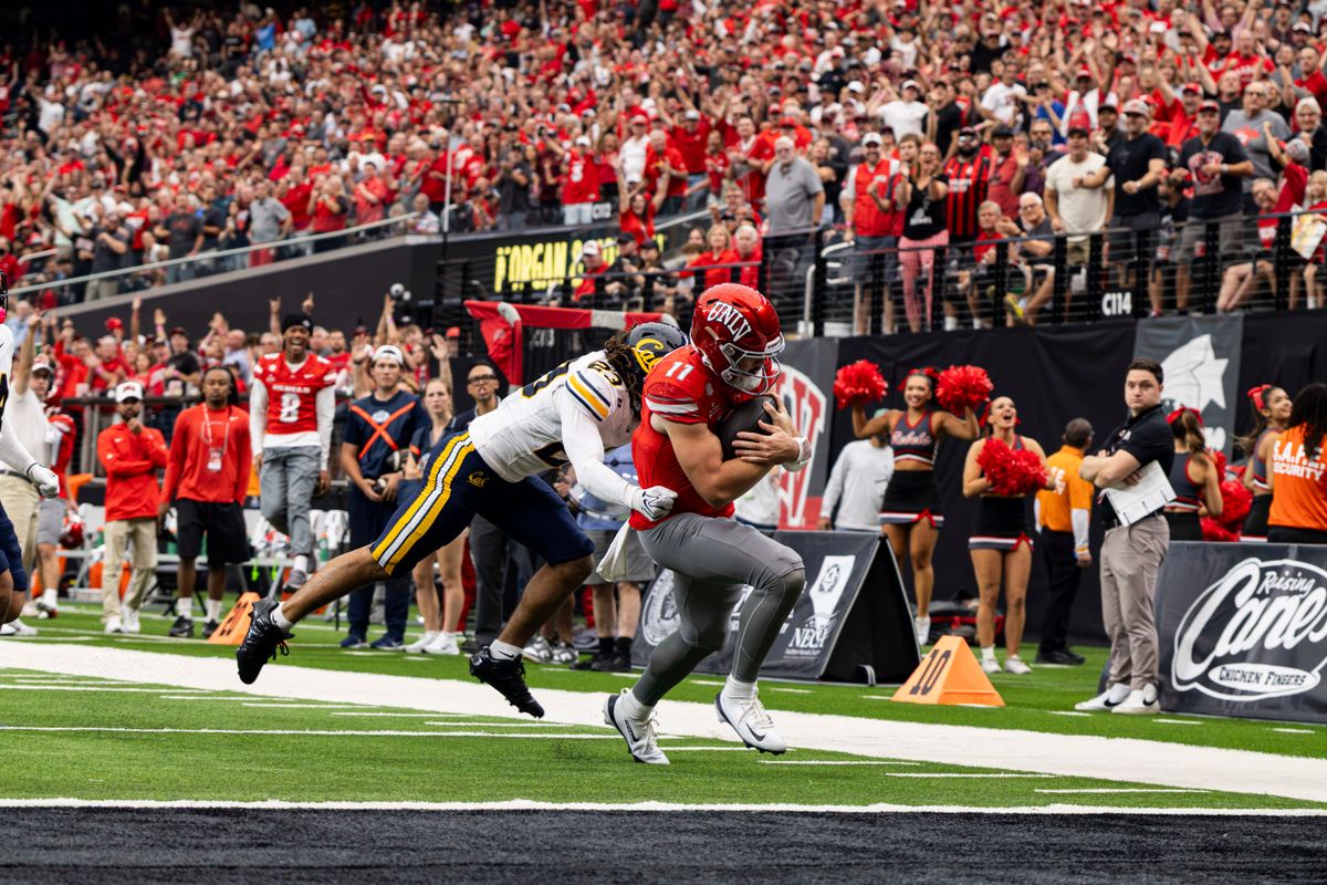 UNLV Rebels QB Jackson Arnold (11) scores a rushing touchdown in the second quarter of a game against the California Golden Bears on Saturday, October 03, 2026, at Allegiant Stadium in Las Vegas, Nevada. UNLV Rebels QB Jackson Arnold (11) scores a rushing touchdown in the second quarter of a game against the California Golden Bears on Saturday, October 03, 2026, at Allegiant Stadium in Las Vegas, Nevada.