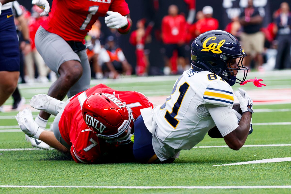 UNLV Football safety Jake Pope (7) tackles California Golden Bears wide reciever Tyree Sams (81) during the second quarter of a game on Saturday, October 3, 2026, at Allegiant Stadium. UNLV Football safety Jake Pope (7) tackles California Golden Bears wide reciever Tyree Sams (81) during the second quarter of a game on Saturday, October 3, 2026, at Allegiant Stadium.