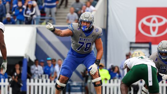 Oct 25, 2025; Memphis, Tennessee, USA; Memphis Tigers offensive lineman Travis Burke (78) gestures toward the South Florida Bulls defense on the line of scrimmage during the second half at Simmons Bank Liberty Stadium. 