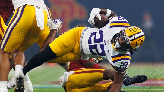 John Emery Jr. #22 of the LSU Tigers is tackled during the Modelo Vegas Kickoff Classic against USC Trojans at Allegiant Stadium on September 1, 2024 in Las Vegas, Nevada. John Emery Jr. #22 of the LSU Tigers is tackled during the Modelo Vegas Kickoff Classic against USC Trojans at Allegiant Stadium on September 1, 2024 in Las Vegas, Nevada.