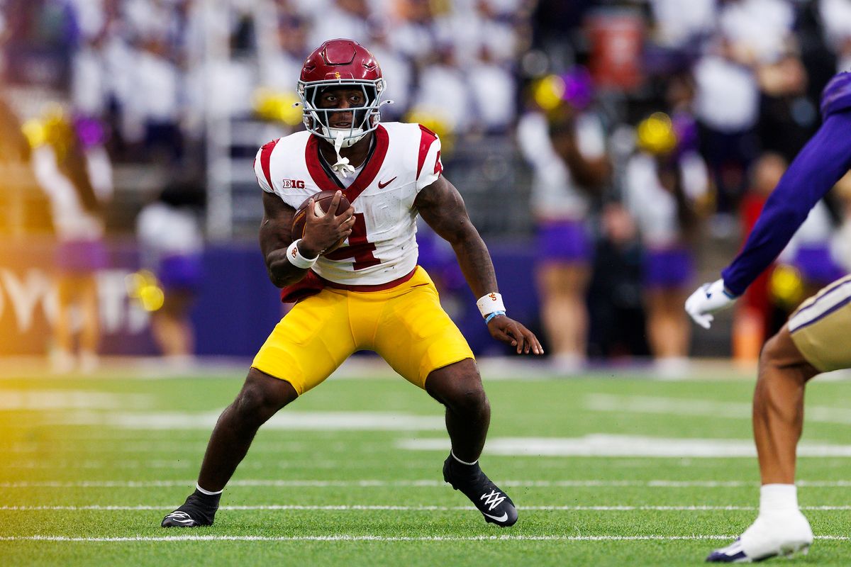USC Trojans running back Woody Marks #4 runs with the ball during the first half against Washington Huskies at Husky Stadium on November 2, 2024 in Seattle, Washington.