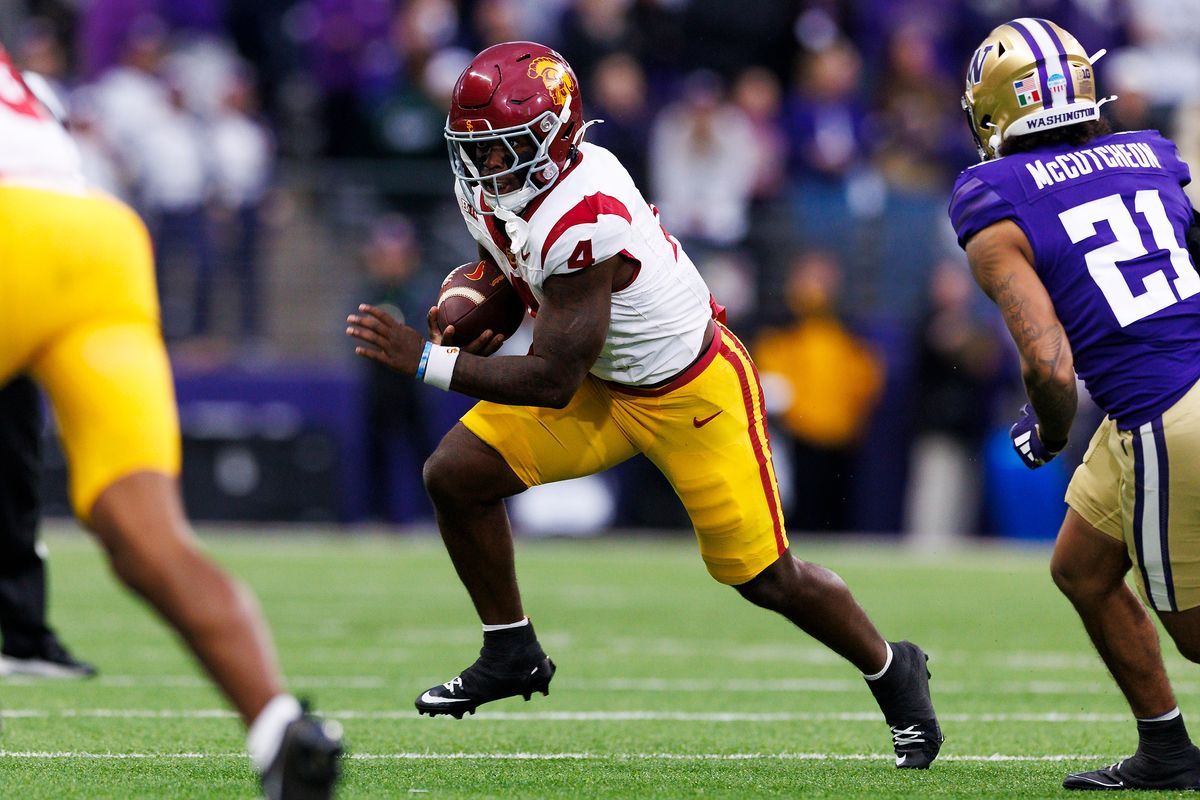 USC Trojans running back Woody Marks #4 runs with the ball during the first half against Washington Huskies at Husky Stadium on November 2, 2024 in Seattle, Washington.