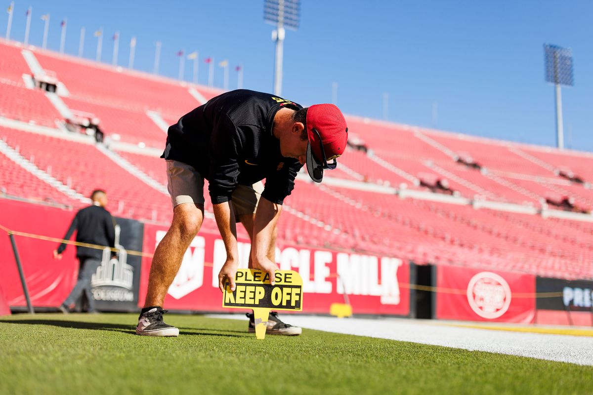 USC grounds crew sets up the field before a game against Nebraska Cornhuskers, November 16 2024 at The Los Angeles Memorial Coliseum in Los Angeles. 