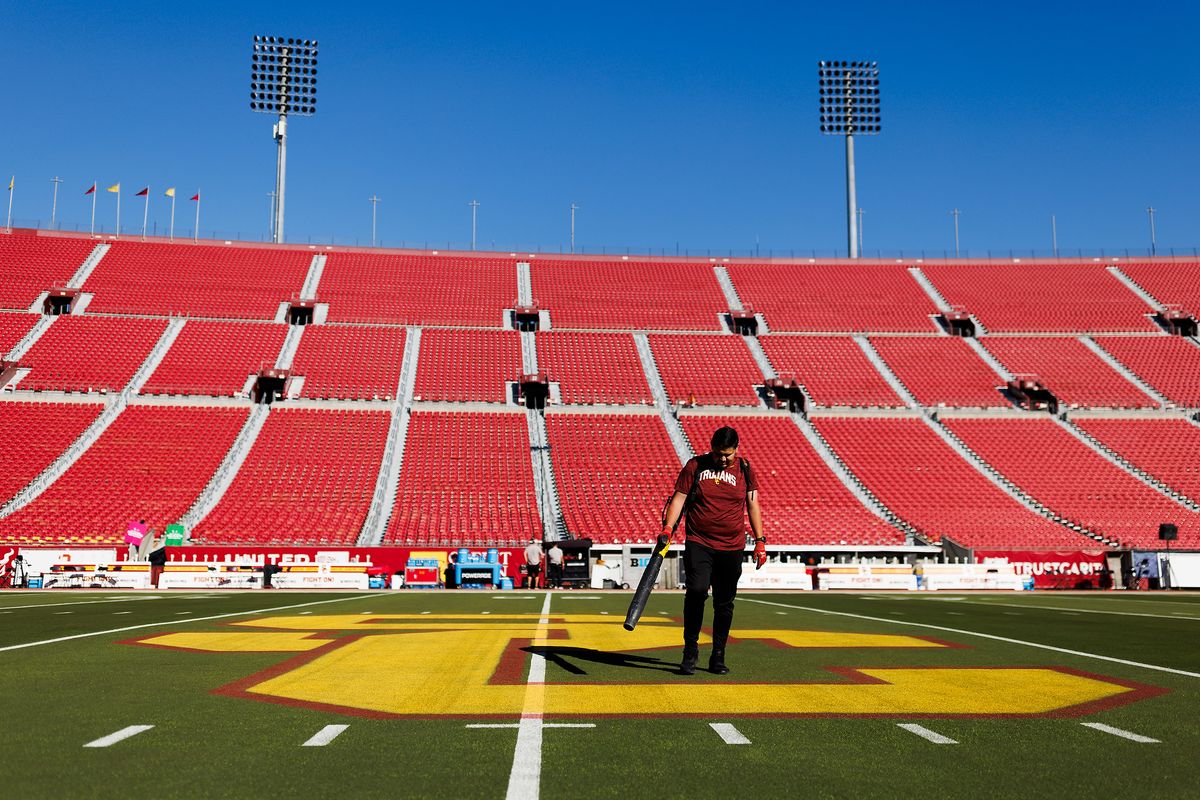 USC grounds crew sets up the field before a game against Nebraska Cornhuskers, November 16 2024 at The Los Angeles Memorial Coliseum in Los Angeles. 