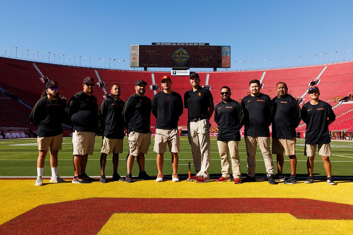 USC grounds crew sets up the field before a game against Nebraska Cornhuskers, November 16 2024 at The Los Angeles Memorial Coliseum in Los Angeles. 
