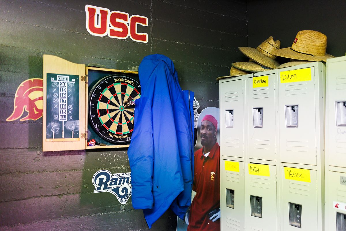 USC grounds crew sets up the field before a game against Nebraska Cornhuskers, November 16 2024 at The Los Angeles Memorial Coliseum in Los Angeles. 