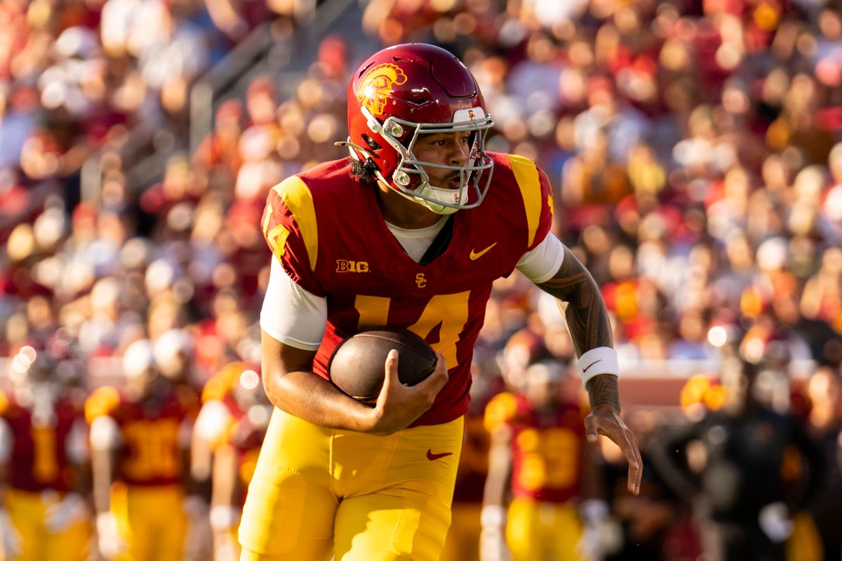 Southern California Trojans quarterback Jayden Maiava (14) carries the ball during an NCAA football game against the Georgia Southern Eagles, Saturday September 6th, 2025 in Los Angeles, California. 
