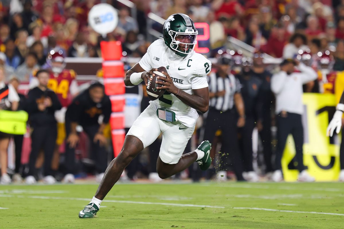 #2 Aidan Chiles of Michigan State drops back to pass during an NCAA football game against USC, September 20, 2025 in Los Angeles, CA.