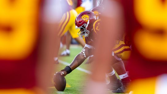 Offensive lineman J'Onre Reed #50 of the USC Trojans gets ready to snap the ball during a college football game against the Michigan Wolverines at the Los Angeles Coliseum on October 11, 2025 in Los Angeles, California. Offensive lineman J'Onre Reed #50 of the USC Trojans gets ready to snap the ball during a college football game against the Michigan Wolverines at the Los Angeles Coliseum on October 11, 2025 in Los Angeles, California.