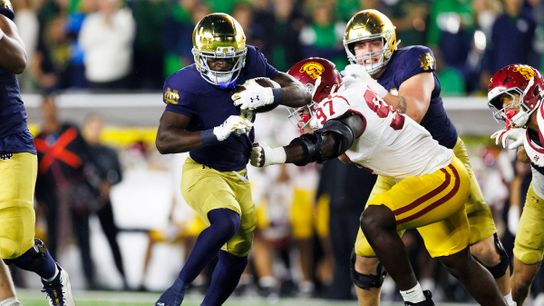 Jeremiyah Love #4 of the Notre Dame Fighting Irish runs with the ball during the game against USC Trojans at Notre Dame Stadium on October 18, 2025 in South Bend, Indiana.