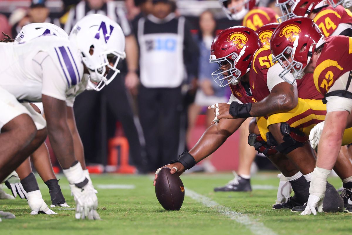 Offensive lineman J'Onre Reed #50 of the USC Trojans prepares to snap the ball during an NCAA football game against the Northwestern Wildcats, Friday November 7, 2025 in Los Angeles, Calif. Offensive lineman J'Onre Reed #50 of the USC Trojans prepares to snap the ball during an NCAA football game against the Northwestern Wildcats, Friday November 7, 2025 in Los Angeles, Calif.
