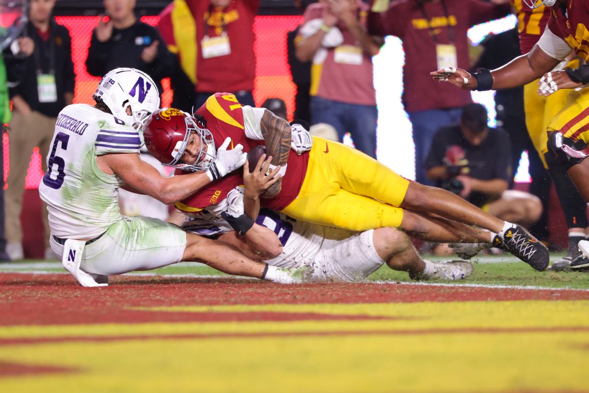 Quarterback Jayden Maiava #14 of the USC Trojans dives across the goal line for a touchdown during an NCAA football game against the Northwestern Wildcats, Friday November 7, 2025 in Los Angeles, Calif. Quarterback Jayden Maiava #14 of the USC Trojans dives across the goal line for a touchdown during an NCAA football game against the Northwestern Wildcats, Friday November 7, 2025 in Los Angeles, Calif.