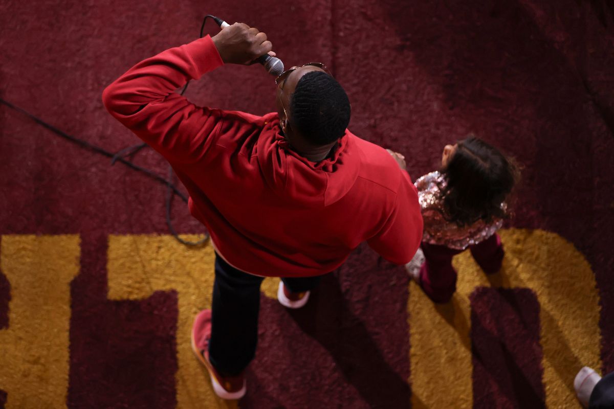 Former USC Trojans football player Keyshawn Johnson leads the team out of the tunnel before an NCAA football game against the Northwestern Wildcats, Friday November 7, 2025 in Los Angeles, Calif. Former USC Trojans football player Keyshawn Johnson leads the team out of the tunnel before an NCAA football game against the Northwestern Wildcats, Friday November 7, 2025 in Los Angeles, Calif.