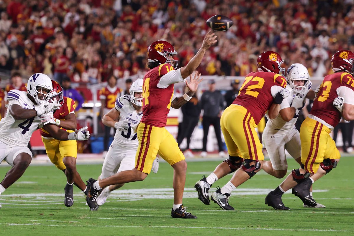 Quarterback Jayden Maiava #14 of the USC Trojans throws a pass during an NCAA football game against the Northwestern Wildcats, Friday November 7, 2025 in Los Angeles, Calif. Quarterback Jayden Maiava #14 of the USC Trojans throws a pass during an NCAA football game against the Northwestern Wildcats, Friday November 7, 2025 in Los Angeles, Calif.