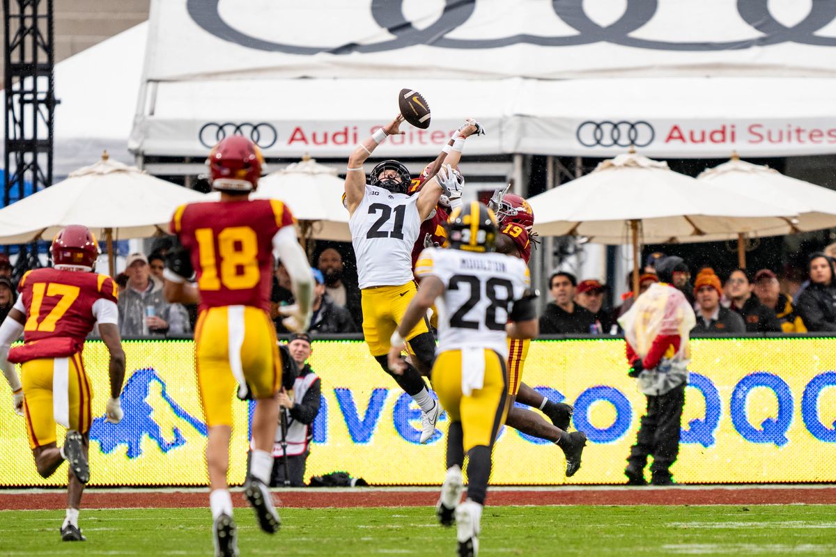 Iowa Hawkeyes defensive back, Watts McBride (21) makes a leaping pass breakup during an NCAAF football game against the USC Trojans on November 15, 2025 in Los Angeles, CA. Iowa Hawkeyes defensive back, Watts McBride (21) makes a leaping pass breakup during an NCAAF football game against the USC Trojans on November 15, 2025 in Los Angeles, CA.