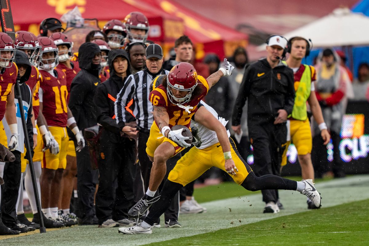 USC Trojans wide receiver, Tanook Hines (16) reaches for a first down during an NCAAF football game against the Iowa Hawkeyes on November 15, 2025 in Los Angeles, CA. USC Trojans wide receiver, Tanook Hines (16) reaches for a first down during an NCAAF football game against the Iowa Hawkeyes on November 15, 2025 in Los Angeles, CA.