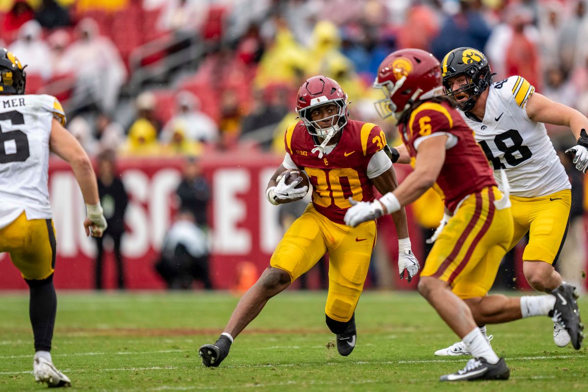 USC Trojans running back, King Miller (30) finds a gap during an NCAAF football game against the Iowa Hawkeyes on November 15, 2025 in Los Angeles, CA. USC Trojans running back, King Miller (30) finds a gap during an NCAAF football game against the Iowa Hawkeyes on November 15, 2025 in Los Angeles, CA.