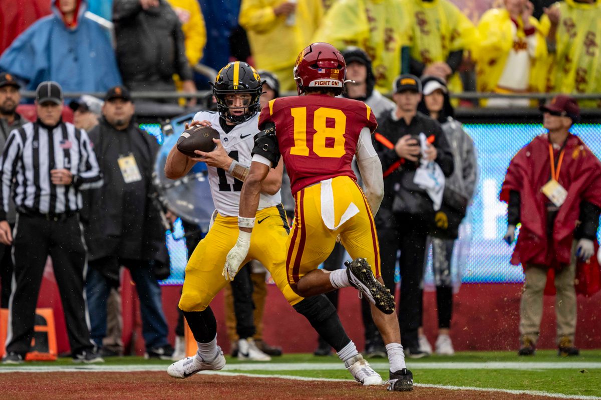 Iowa Hawkeyes quarterback, Mark Gronowski (11) catches a touchdown pass during an NCAAF football game against the USC Trojans on November 15, 2025 in Los Angeles, CA. Iowa Hawkeyes quarterback, Mark Gronowski (11) catches a touchdown pass during an NCAAF football game against the USC Trojans on November 15, 2025 in Los Angeles, CA.