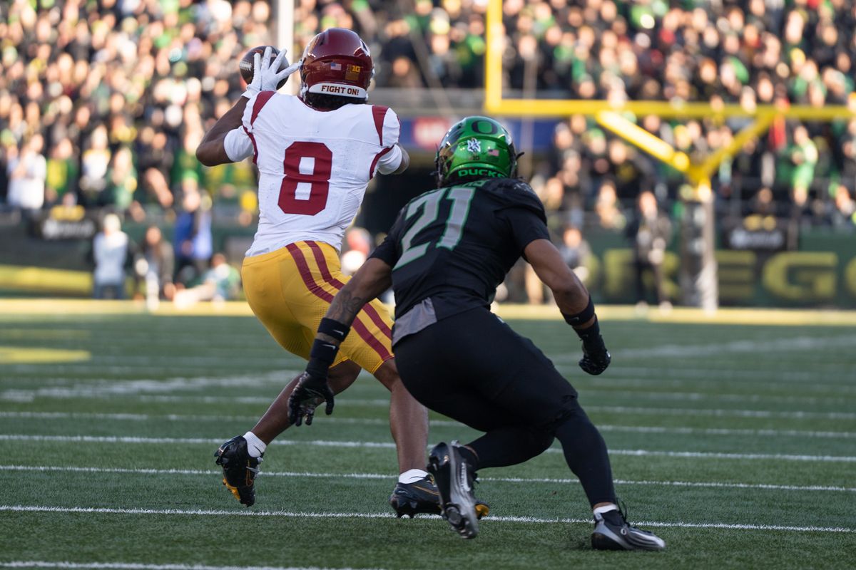 USC Trojans wide receiver, Ja' Kobi Lane (8) makes a catch in the middle of the field during an NCAAF football game against the Oregon Ducks on November 22, 2025 in Eugene, OR.