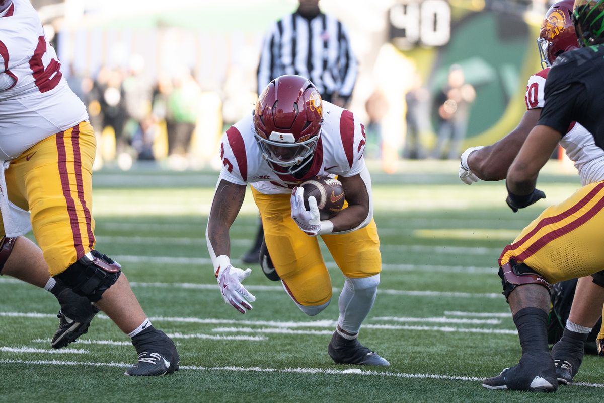 USC Trojans running back, King Miller (30) runs through the middle during an NCAAF football game against the Oregon Ducks on November 22, 2025 in Eugene, OR.