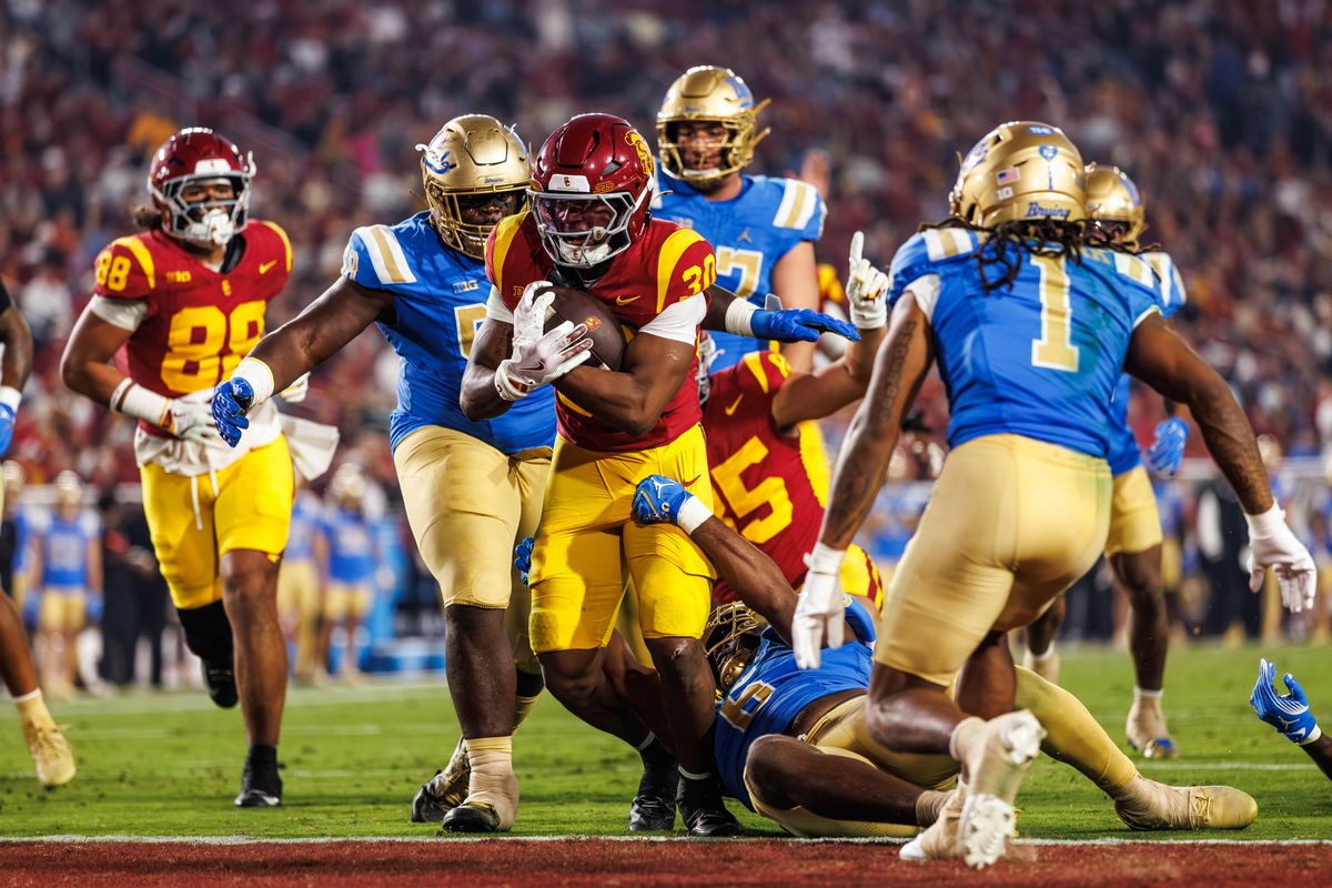 Southern California Trojans running back King Miller (30) runs the ball in the end zone for a touchdown during a NCAAF game against the UCLA Bruins on November 29, 2025 in Los Angeles, CA.