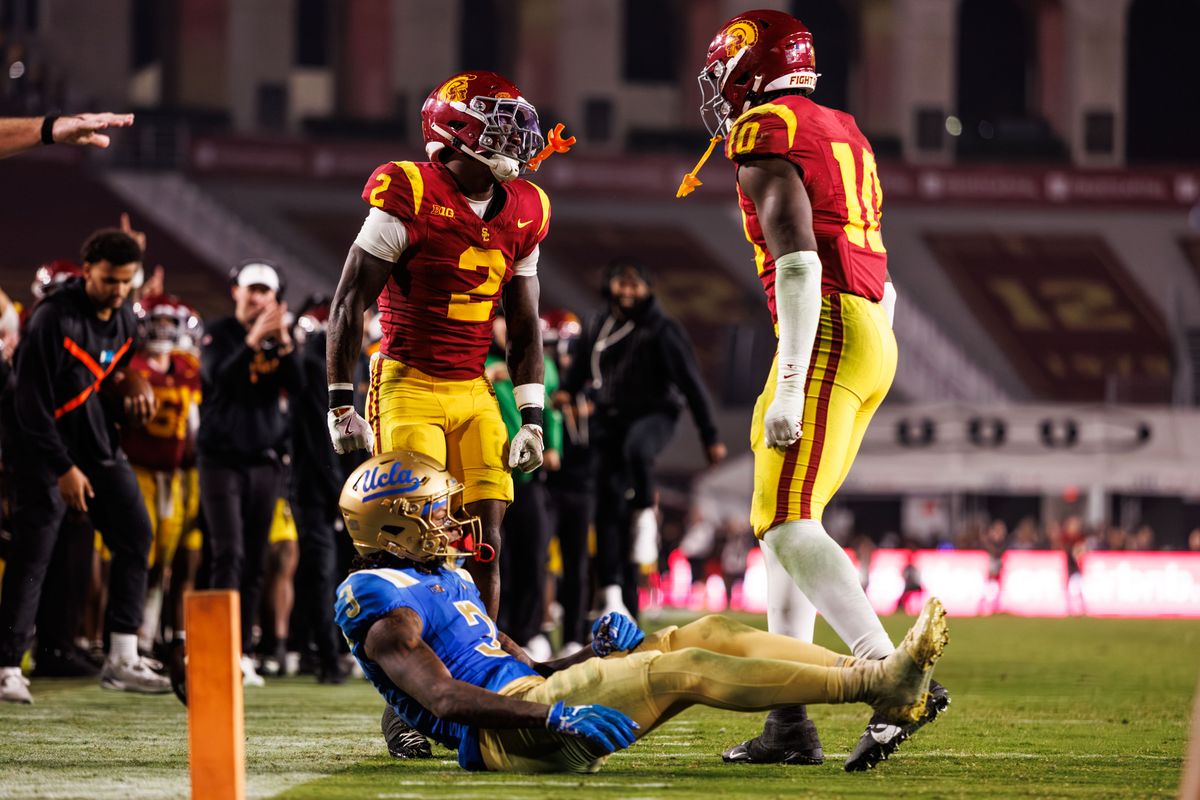 Southern California Trojans defensive back DJ Harvey (2) celebrates his tackle during a NCAAF game against the UCLA Bruins on November 29, 2025 in Los Angeles, CA.