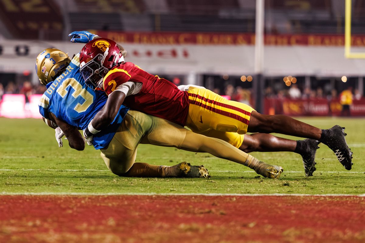 UCLA Bruins wide receiver Kwazi Gilmer (3) gets tackled close to the end zone during a NCAAF game against the Southern California Trojans on November 29, 2025 in Los Angeles, CA.