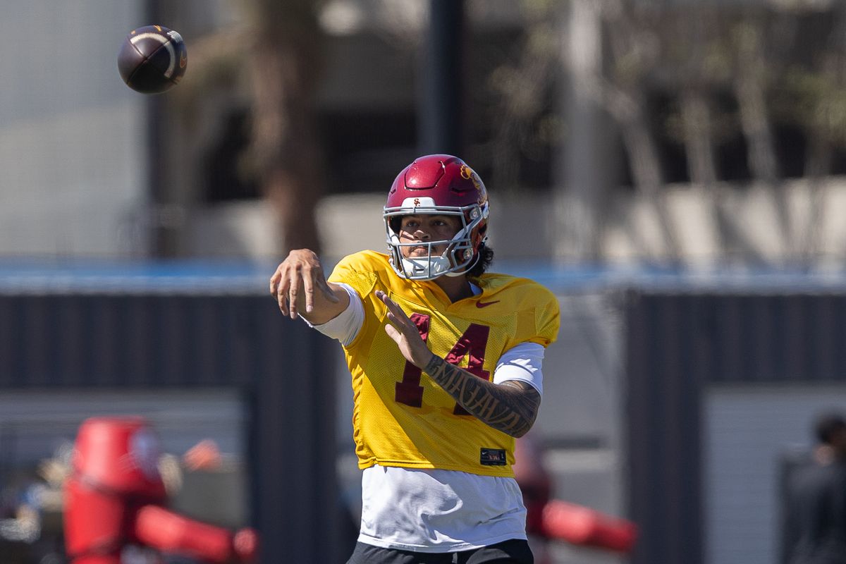 USC quarterback Jayden Maiava (14) throws a pass during practice at Howard Jones Field, Wednesday, Aug. 19, 2026, in Los Angeles. USC quarterback Jayden Maiava (14) throws a pass during practice at Howard Jones Field, Wednesday, Aug. 19, 2026, in Los Angeles.