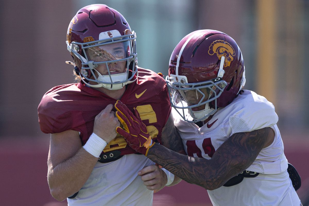 USC wide receiver Luke Degner (86) and cornerback RJ Sermons (21) go one on one during practice at Howard Jones Field, Wednesday, Aug. 19, 2026, in Los Angeles. USC wide receiver Luke Degner (86) and cornerback RJ Sermons (21) go one on one during practice at Howard Jones Field, Wednesday, Aug. 19, 2026, in Los Angeles.