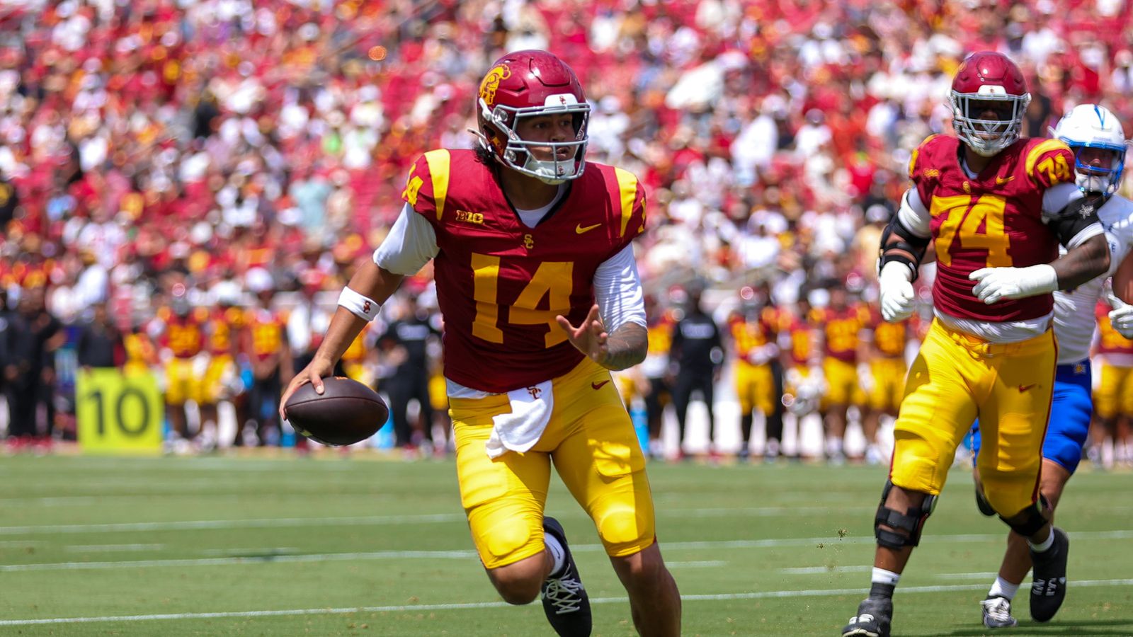 USC Trojan QB Jayden Maiava (14) runs with the football during an NCAA football game against the San Jose State Spartans on August 29, 2026 in Los Angeles, CA. USC Trojan QB Jayden Maiava (14) runs with the football during an NCAA football game against the San Jose State Spartans on August 29, 2026 in Los Angeles, CA.
