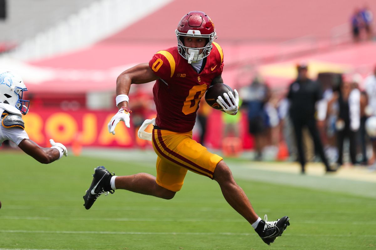 USC Trojan WR Zacharyus Williams (0) runs with the football during an NCAA football game agains the San Jose State Spartans on August 29, 2026 in Los Angeles, CA. USC Trojan WR Zacharyus Williams (0) runs with the football during an NCAA football game agains the San Jose State Spartans on August 29, 2026 in Los Angeles, CA.