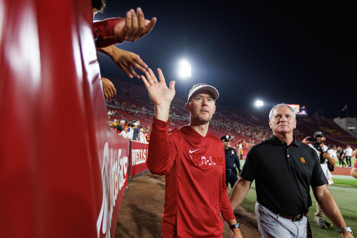 Head coach Lincoln Riley of the USC Trojans interacts with fans after an NCAA Football game against the Fresno State Bulldogs on September 4, 2026 at The Los Angeles Memorial Coliseum in Los Angeles, California. Head coach Lincoln Riley of the USC Trojans interacts with fans after an NCAA Football game against the Fresno State Bulldogs on September 4, 2026 at The Los Angeles Memorial Coliseum in Los Angeles, California.
