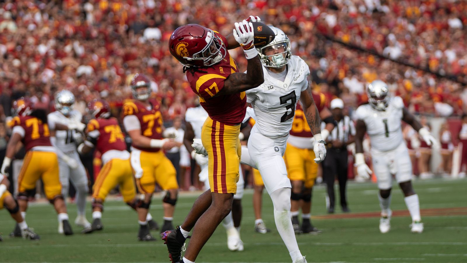 USC Trojan WR Kayden Dixon-Wyatt (17) makes a rediculouse catch over his defender during an NCAA football game against the Oregon Ducks on September 26, 2026 in Los Angeles, CA. USC Trojan WR Kayden Dixon-Wyatt (17) makes a rediculouse catch over his defender during an NCAA football game against the Oregon Ducks on September 26, 2026 in Los Angeles, CA.