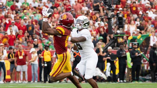 USC Trojan WR makes a catch while his defender was on his back during an NCAA football game against the Oregon Ducks on September 26, 2026 in Los Angeles, CA.