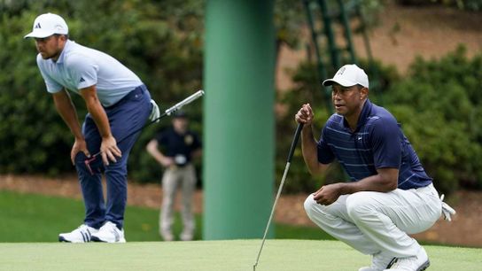 Tiger sits on cut line with 7 holes to go at suspended Masters (Golf)