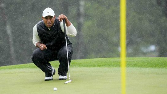 Tiger Woods survives rough finish to make Masters cut (Golf)