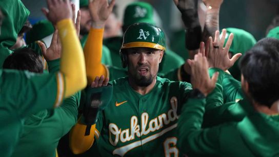 Offensive showcase sees A's edge Angels in 10 (MLB)