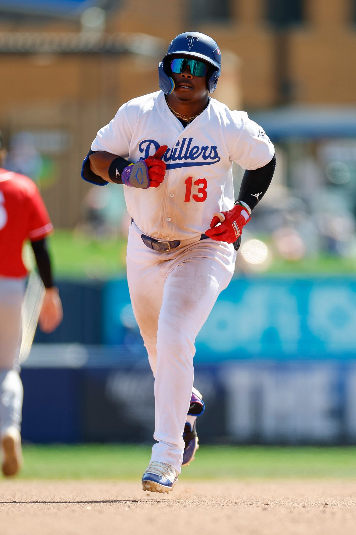 Zyhir Hope #13 of the Tulsa Drillers rounds the bases on his home run during a game against the Arkansas Travelers at ONEOK Field on April 19, 2026 in Tulsa, Oklahoma.
