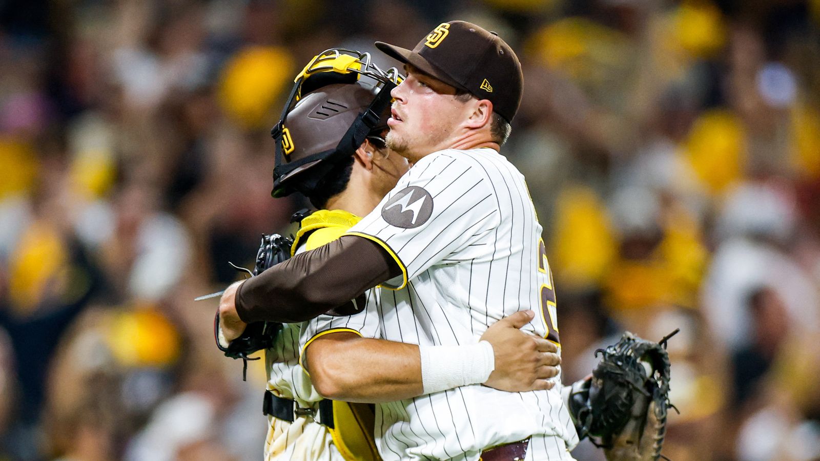 Sep 26, 2026; San Diego, California, USA; San Diego Padres relief pitcher Mason Miller (22) celebrates with catcher Ethan Salas (8) after defeating the Arizona Diamondbacks at Petco Park. Sep 26, 2026; San Diego, California, USA; San Diego Padres relief pitcher Mason Miller (22) celebrates with catcher Ethan Salas (8) after defeating the Arizona Diamondbacks at Petco Park.